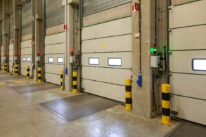 interior shot of a warehouse with a row of doors